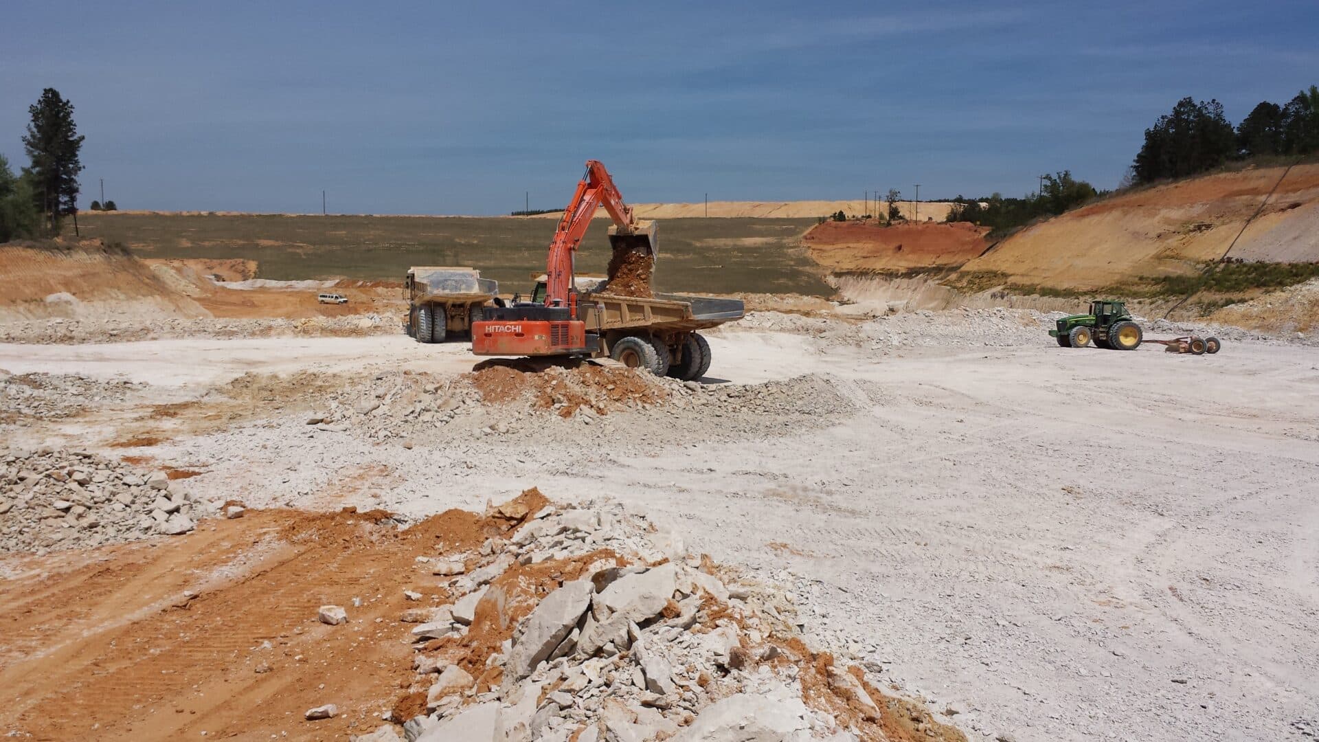 excavator loading truck