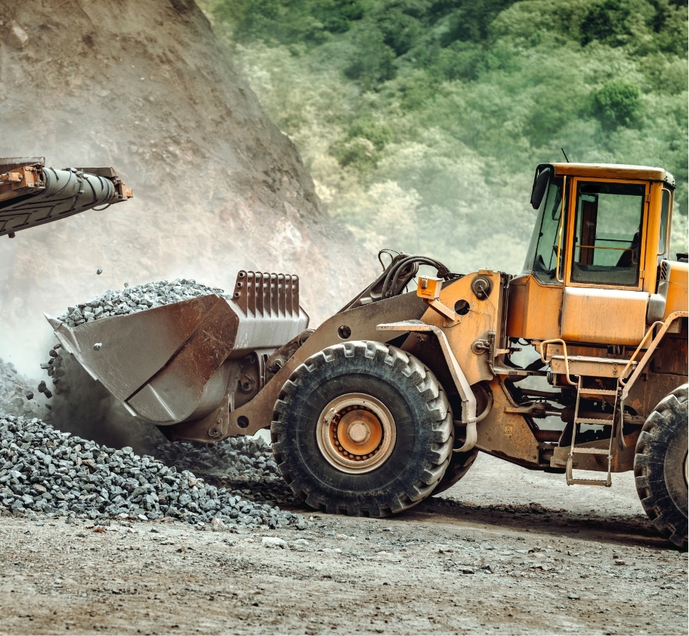 excavator hauling minerals